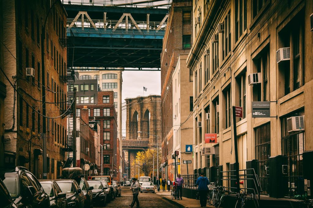 Masonry buildings along a city streetscape; representative imagery, not the client project.